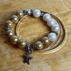 Set of 3 silver tone white and cream faux pearl bracelets with starfish charm
